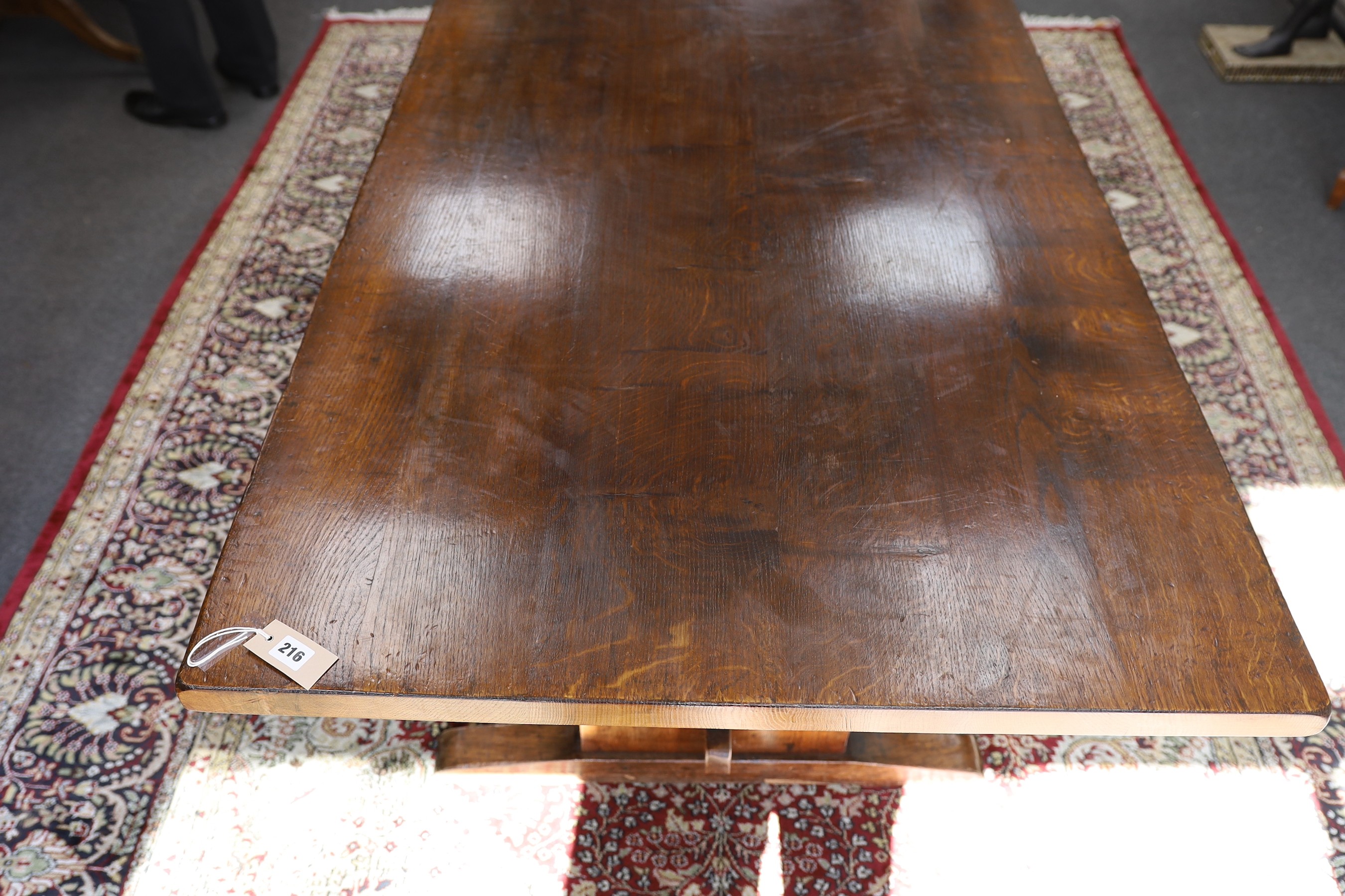 A Titchmarsh and Godwin rectangular oak refectory dining table, length 213cm, width 90cm, height 78cm